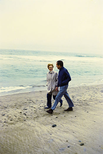 President and Mrs. Nixon enjoy a walk on the beach near the San Clemente "Western White House" Photo: Richard Nixon Presidential Library and Museum.